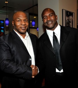 wi-boxers-mike-tyson-and-evander-holyfield-pose-backduring-the-17th-annual-espy-awards-266x300